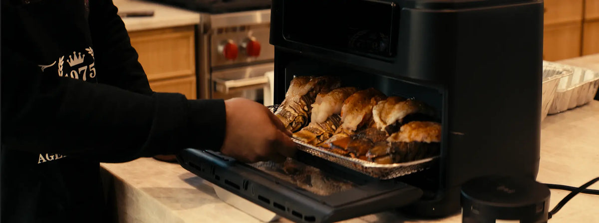 Food tray being pulled from the Big Boi Air Fryer